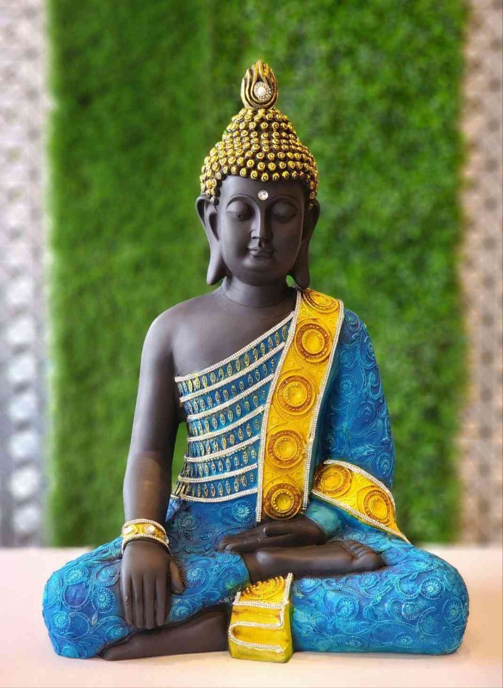 Polyresin Buddha ji Statue with stones decor